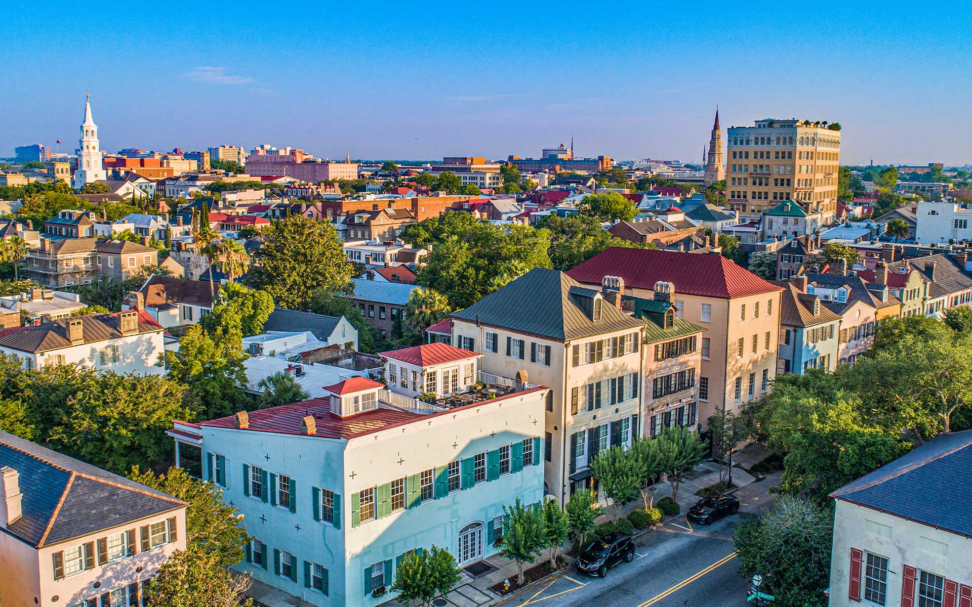 Homepage - Aerial View of City and Rainbow Row in Charleston, South Carolina at Sunset